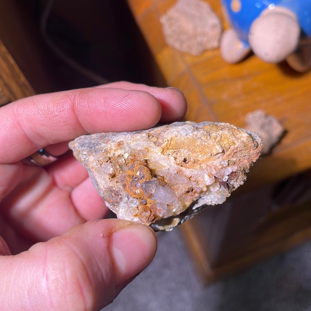 Quartz crystal matrix with iron and malachite inclusion.